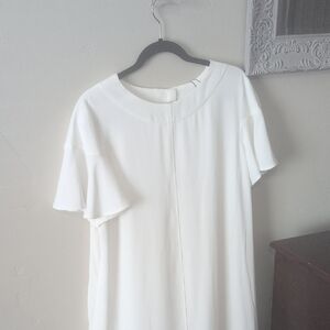 Elegant White Dress with Ruffle Sleeves